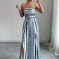 👗 TERAZ 50% ZNIŻKI! 💥 Kombinezon w geometryczne wzory z dekoltem typu halter i rozcięciem z boku – niepowtarzalny wzór i elastyczny tył – uniwersalny, idealny na letnie imprezy lub na wakacje ✨